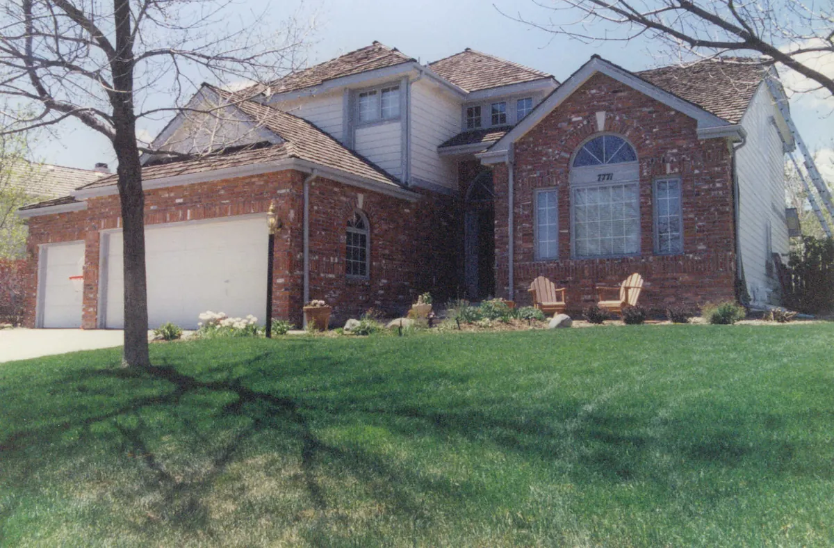 Brick two-story home — before