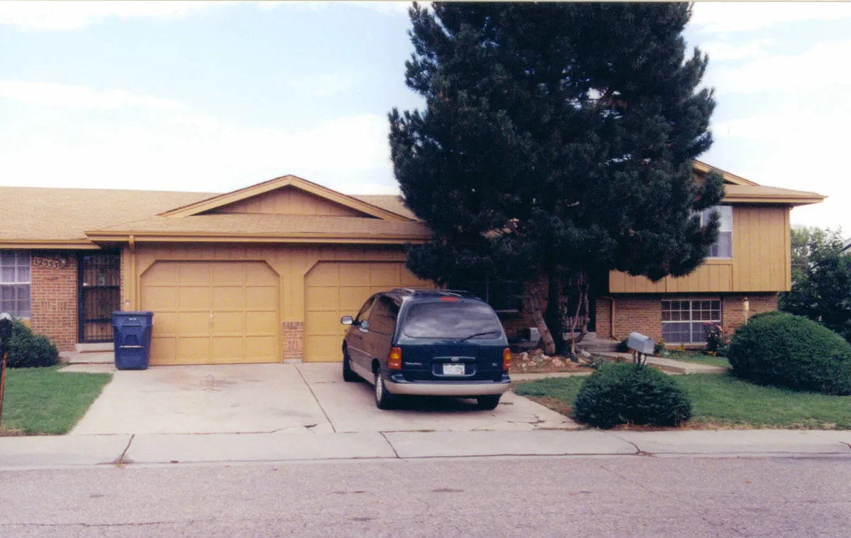 Ranch home with tall pine — after