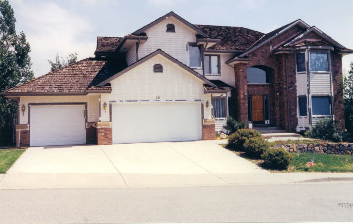 Brick and siding split-level — before