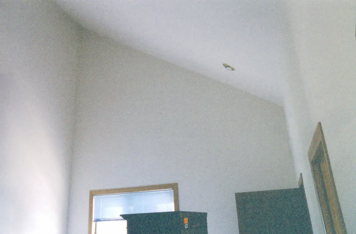 Vaulted bedroom — before