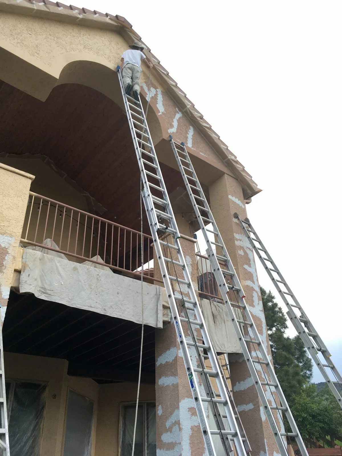 Masking and prep below a balcony