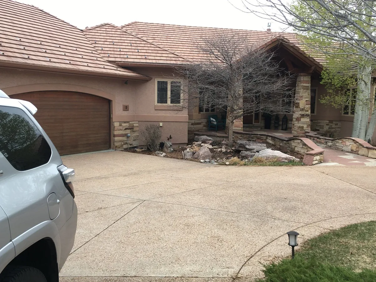 Tile-roof ranch home after repainting