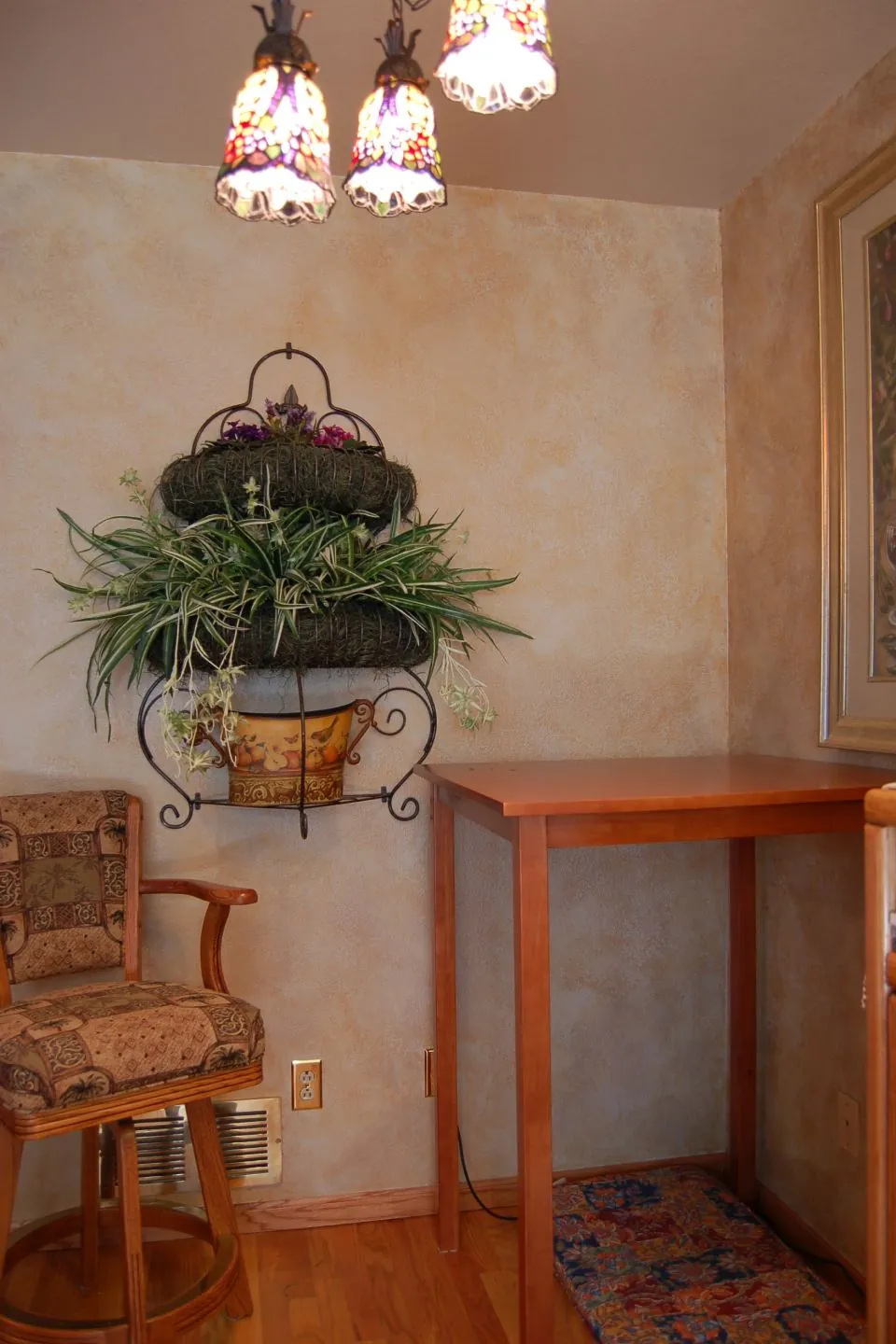 Glazed corner with wrought iron accents