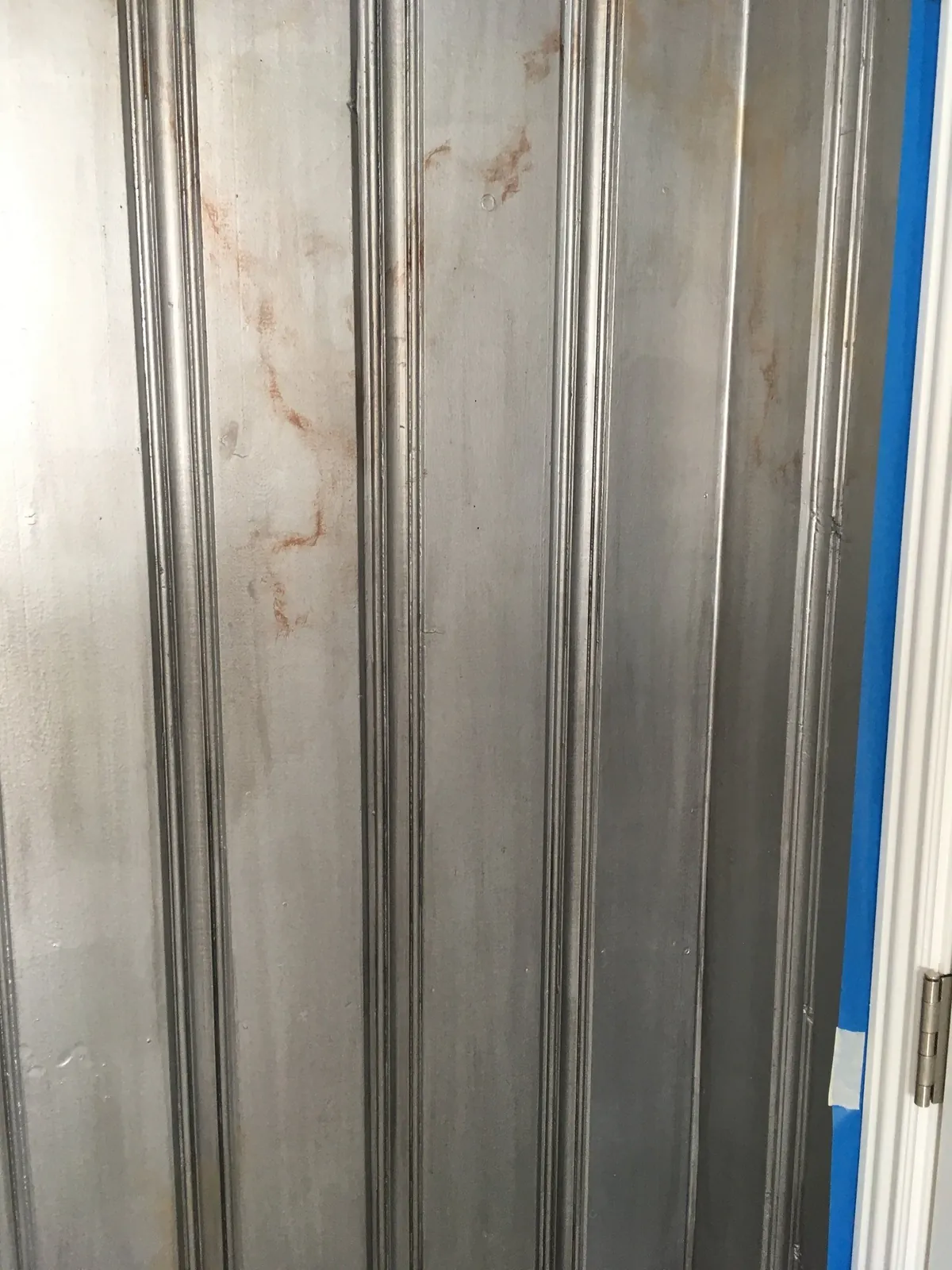 Metallic silver glaze on beadboard paneling