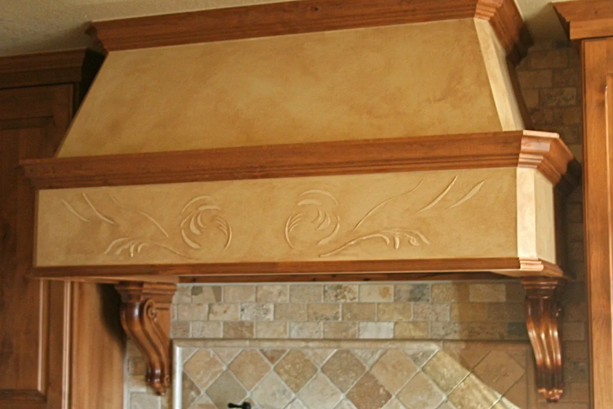 Range hood glazed to match the kitchen stone