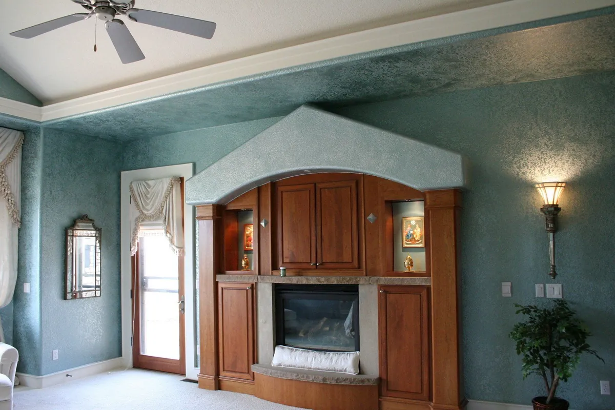 Primary bedroom in a layered teal glaze