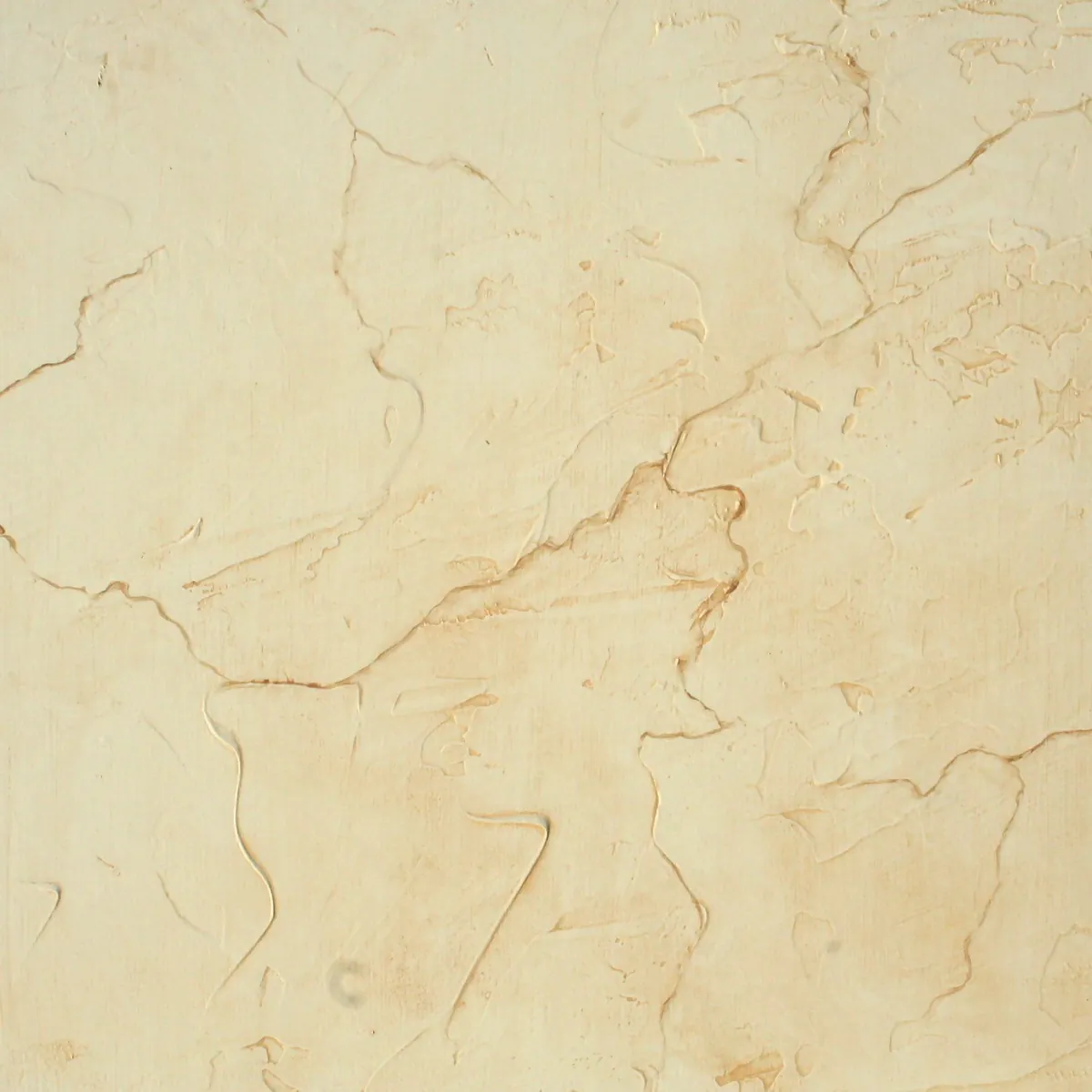 Aged cracked plaster finish in warm cream