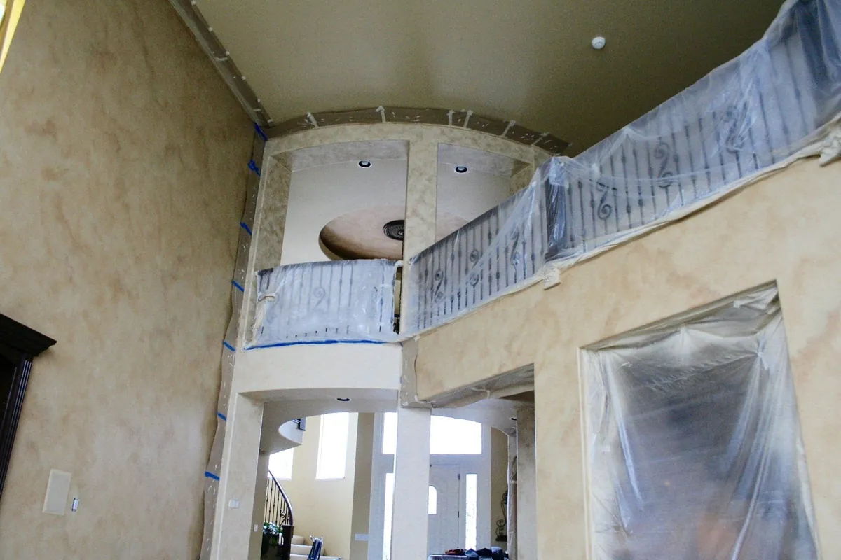 Two-story great room with a balcony loft