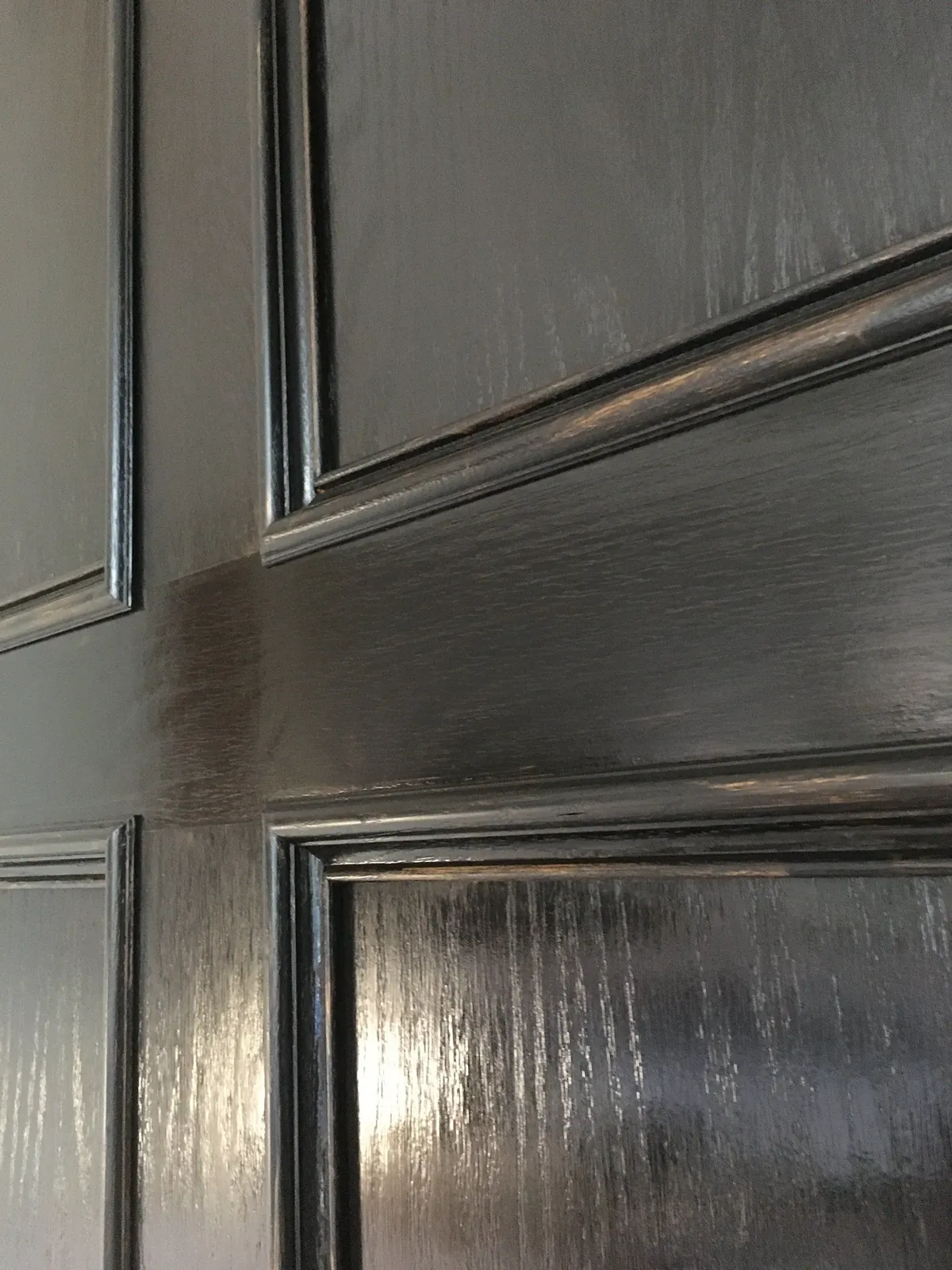 Gel-stained raised panel in black