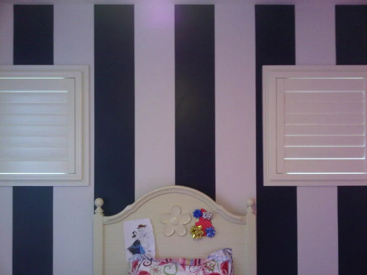 Navy and white wide-stripe bedroom